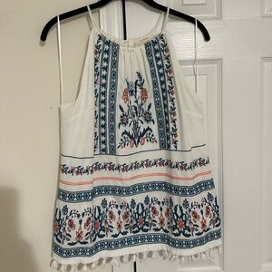 Blue Nutria Embroidered tank with fringe hem.